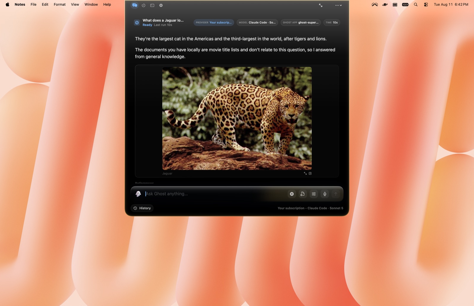 Ghost answering "What does a Jaguar look like" from the top-center notch, with the photograph inline in the answer